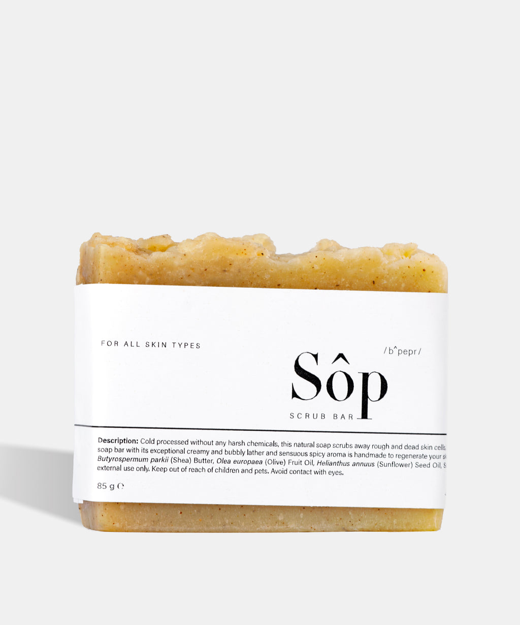 Atelier Beautanique Sôp Black Pepper Scrub Soap Bar on Gray Background with Light Shadow