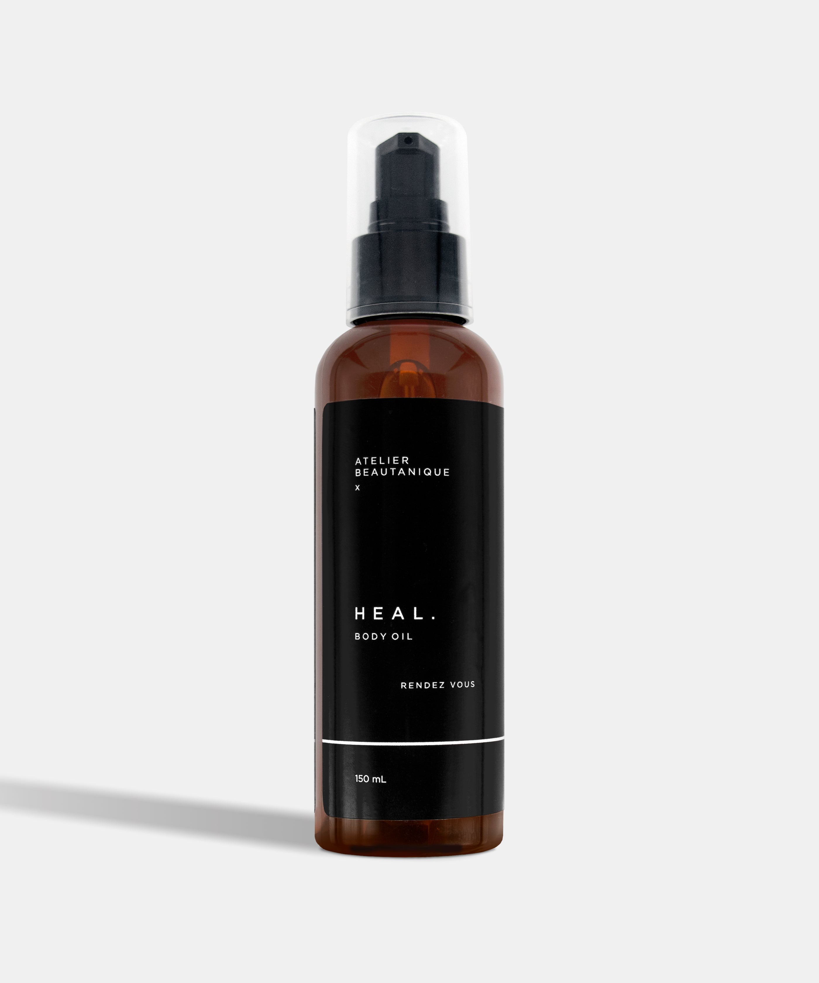 Atelier Beautanique HEAL. Rendez Vous Body Oil Bottle on Grey Background with Light Shadow