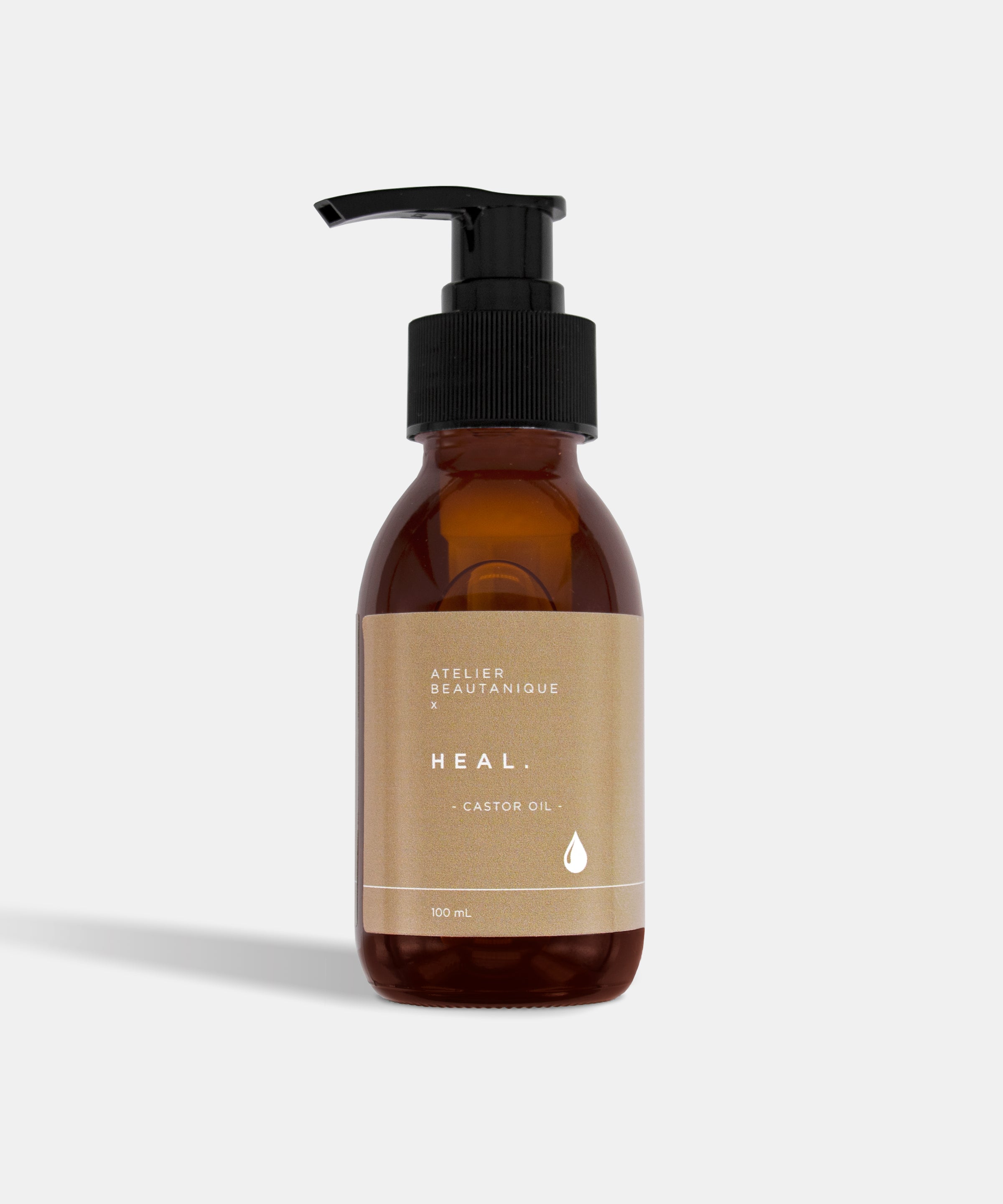 Atelier Beautanique HEAL. Castor Oil Bottle on Grey Background with Light Shadow