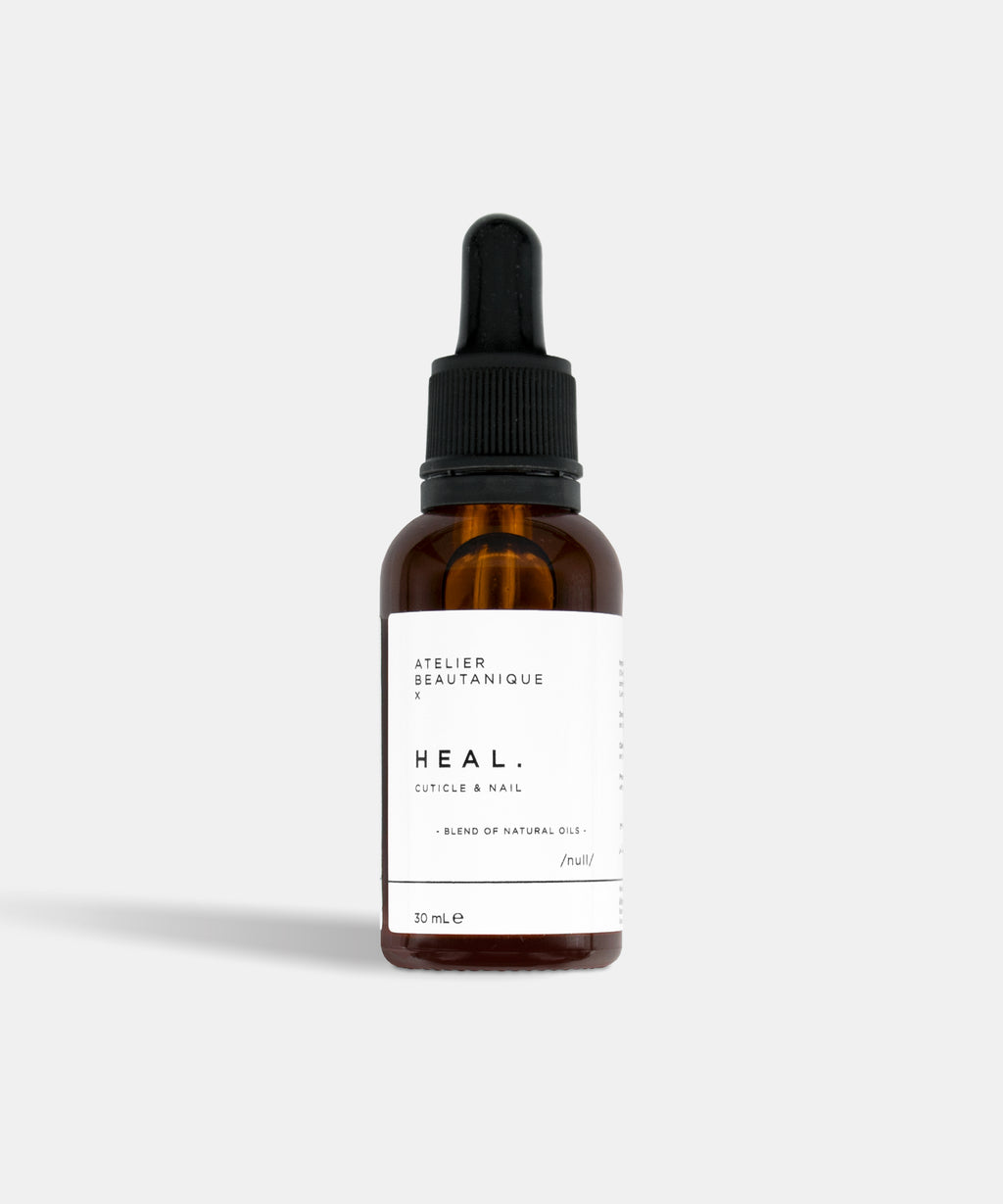 Atelier Beautanique HEAL. Nail & Cuticle Oil Bottle on Grey Background with Light Shadow