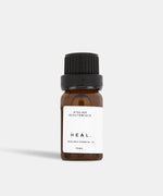 Load image into Gallery viewer, Atelier Beautanique HEAL. Bergamot Essential Oil 10mL Bottle on Grey Background with Light Shadow
