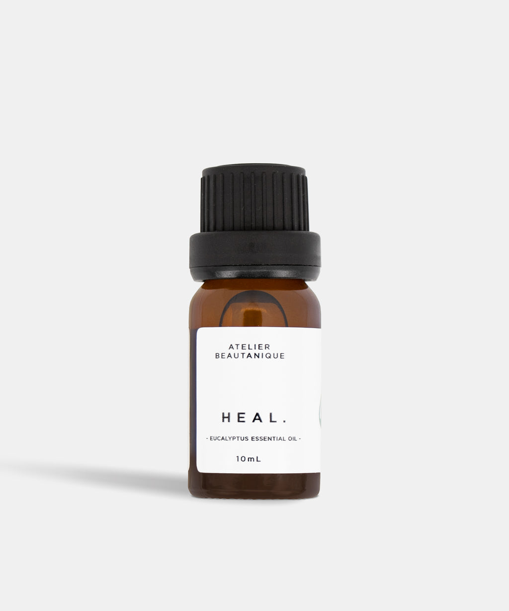 Atelier Beautanique HEAL. Eucalyptus Essential Oil 10mL Bottle on Grey Background with Light Shadow