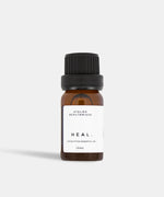Load image into Gallery viewer, Atelier Beautanique HEAL. Eucalyptus Essential Oil 10mL Bottle on Grey Background with Light Shadow
