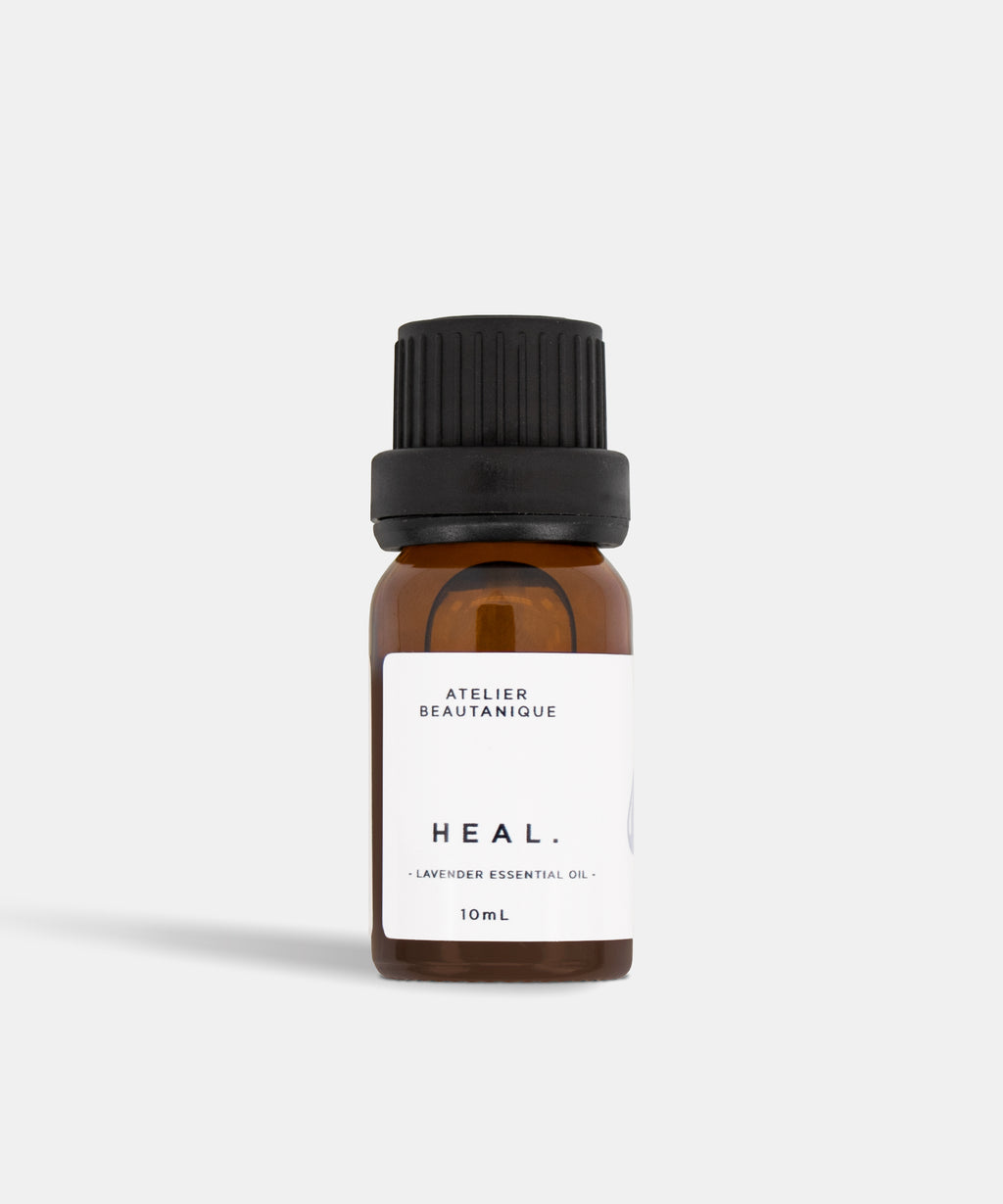 Atelier Beautanique HEAL. Lavender Essential Oil 10mL Bottle on Grey Background with Light Shadow