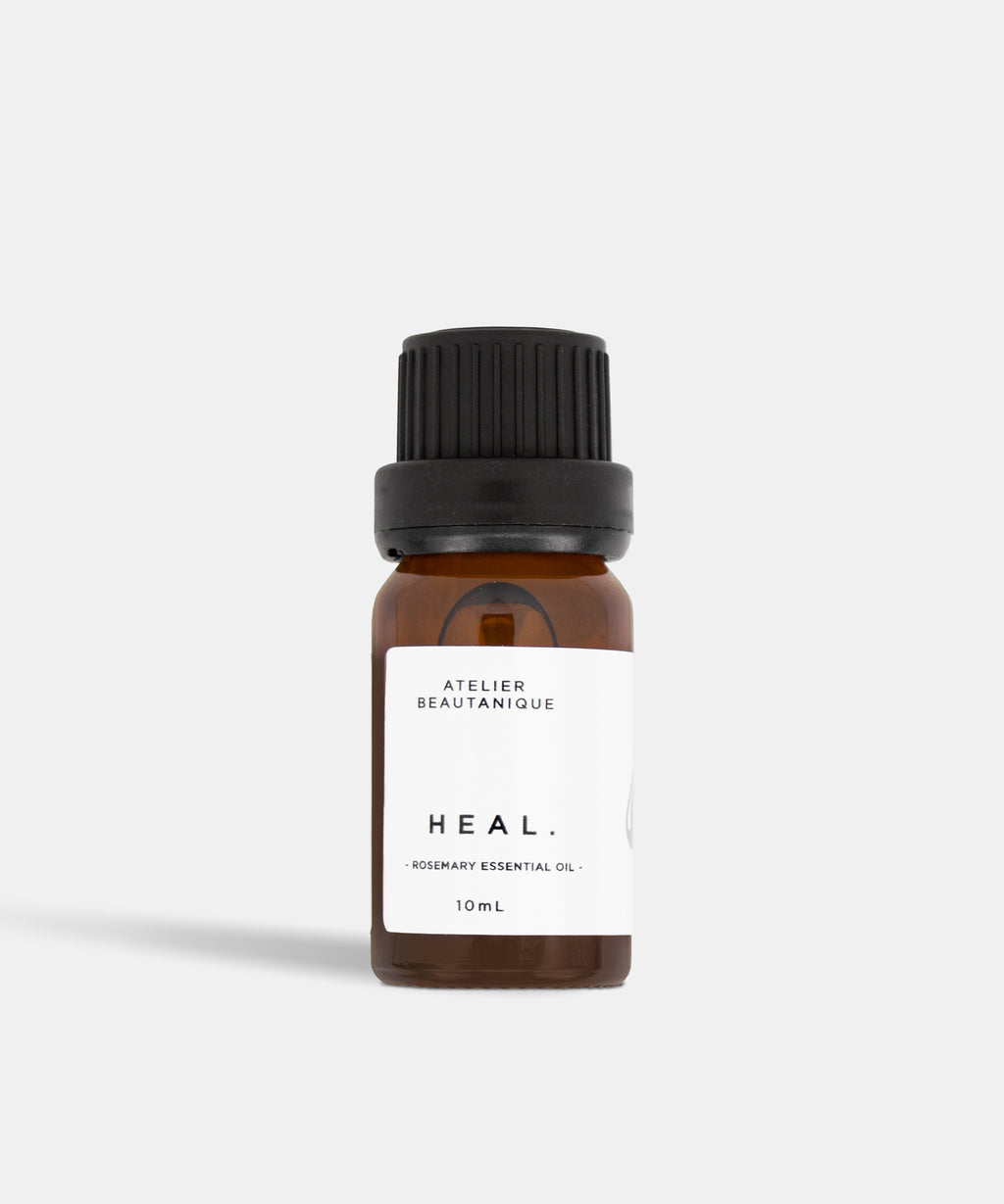 Atelier Beautanique HEAL. Rosemary Essential Oil 10mL Bottle on Grey Background with Light Shadow