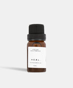 Load image into Gallery viewer, Atelier Beautanique HEAL. Tea Tree Essential Oil Bottle on Grey Background with Light Shadow
