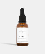 Load image into Gallery viewer, Atelier Beautanique HEAL. Frankincense Essential 30mL Oil Bottle on Grey Background with Light Shadow
