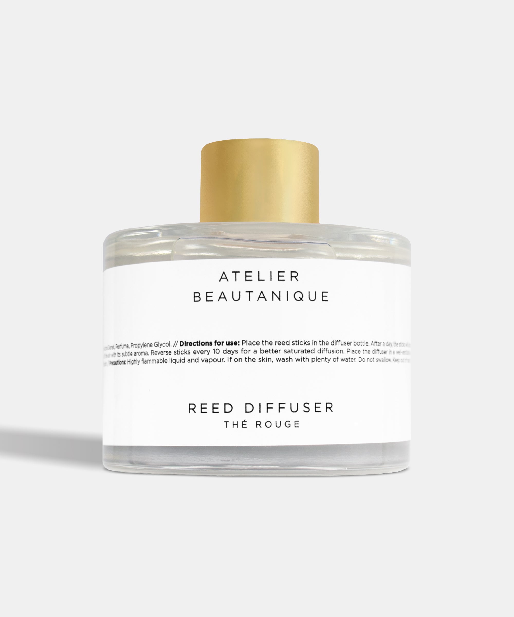 Atelier Beautanique Reed Diffuser Bottle on Grey Background with Light Shadow