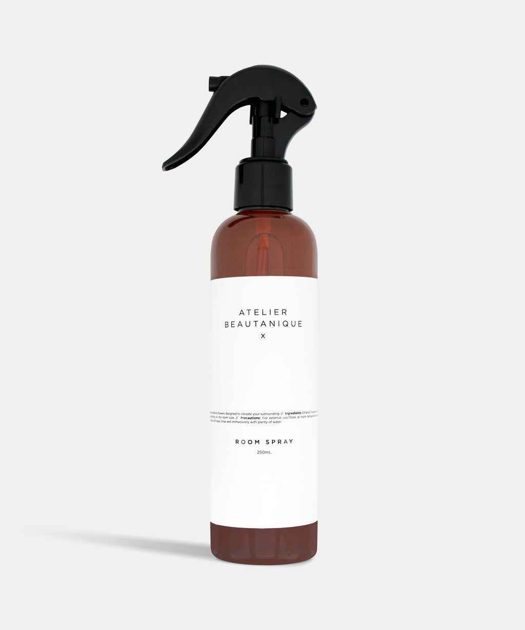 Atelier Beautanique Room Spray Bottle on Grey Background with Light Shadow