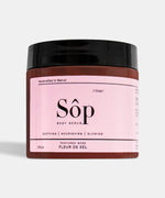 Load image into Gallery viewer, Atelier Beautanique Sôp Rose Body Scrub Jar on Gray Background with Light Shadow
