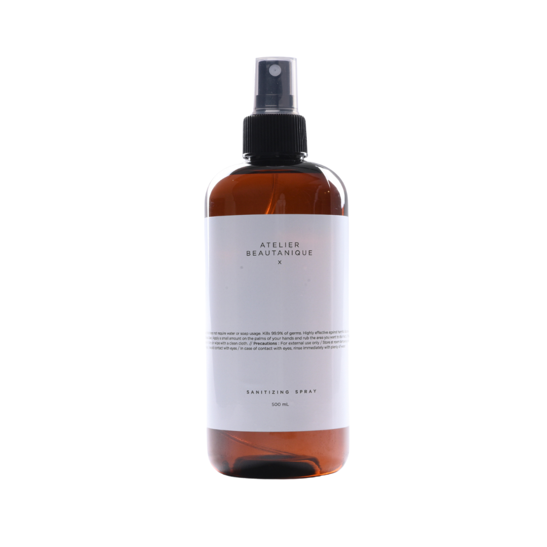 Atelier Beautanique Sanitizing Spray Bottle on Grey Background with Light Shadow