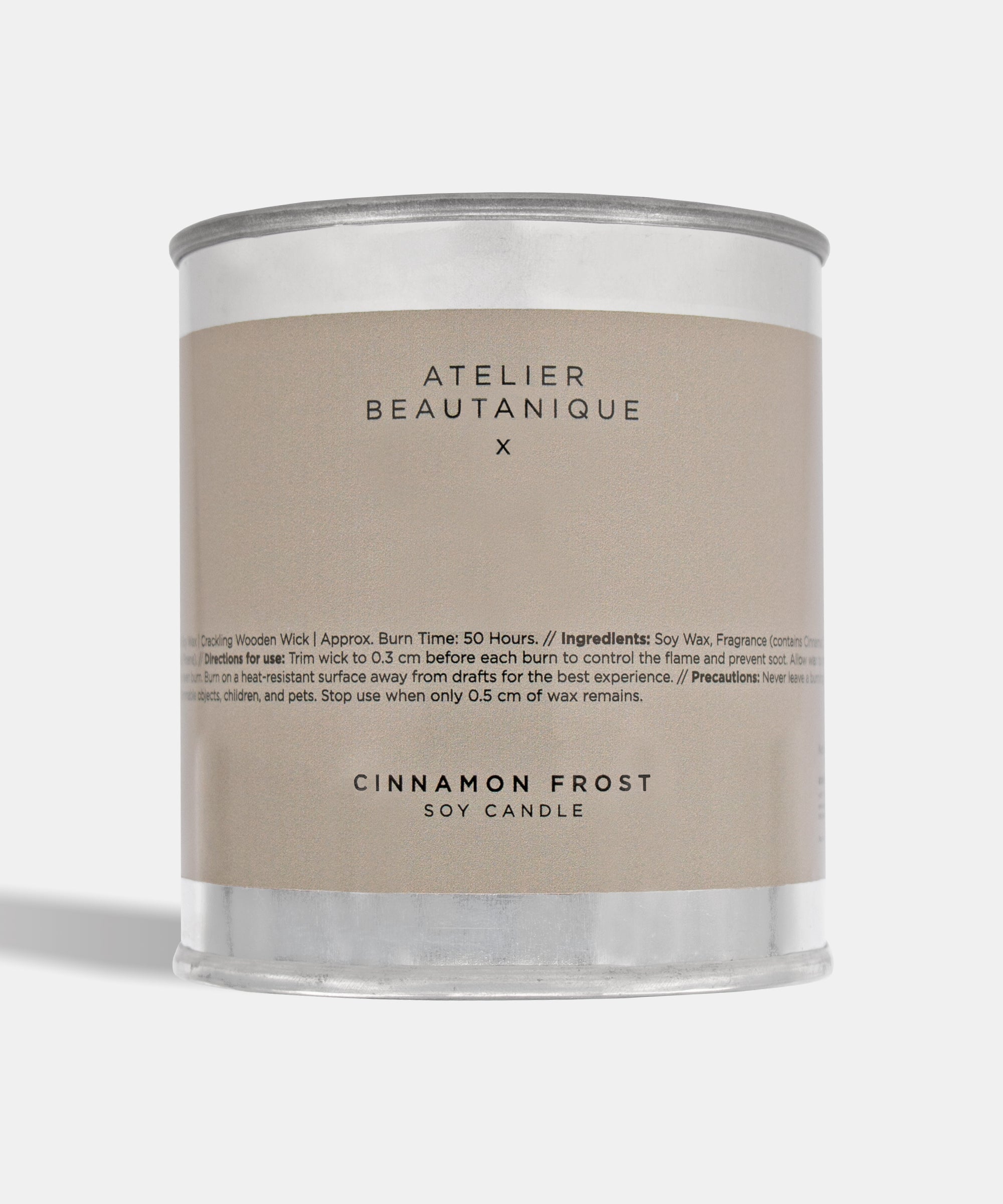 Atelier Beautanique Cinnamon Frost Soy Candle on Gray Background with Light Shadow
