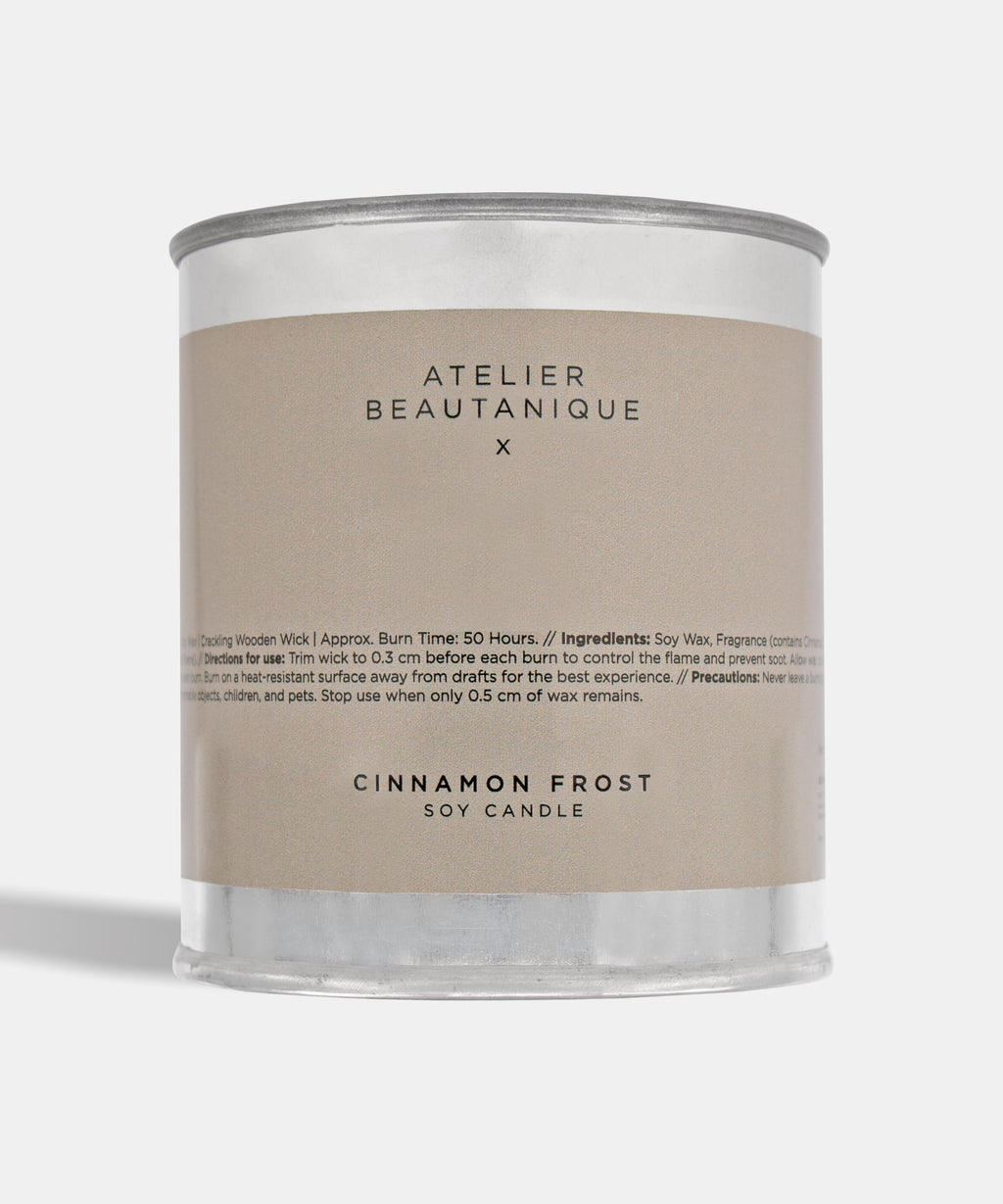 Atelier Beautanique Cinnamon Frost Soy Candle on Gray Background with Light Shadow